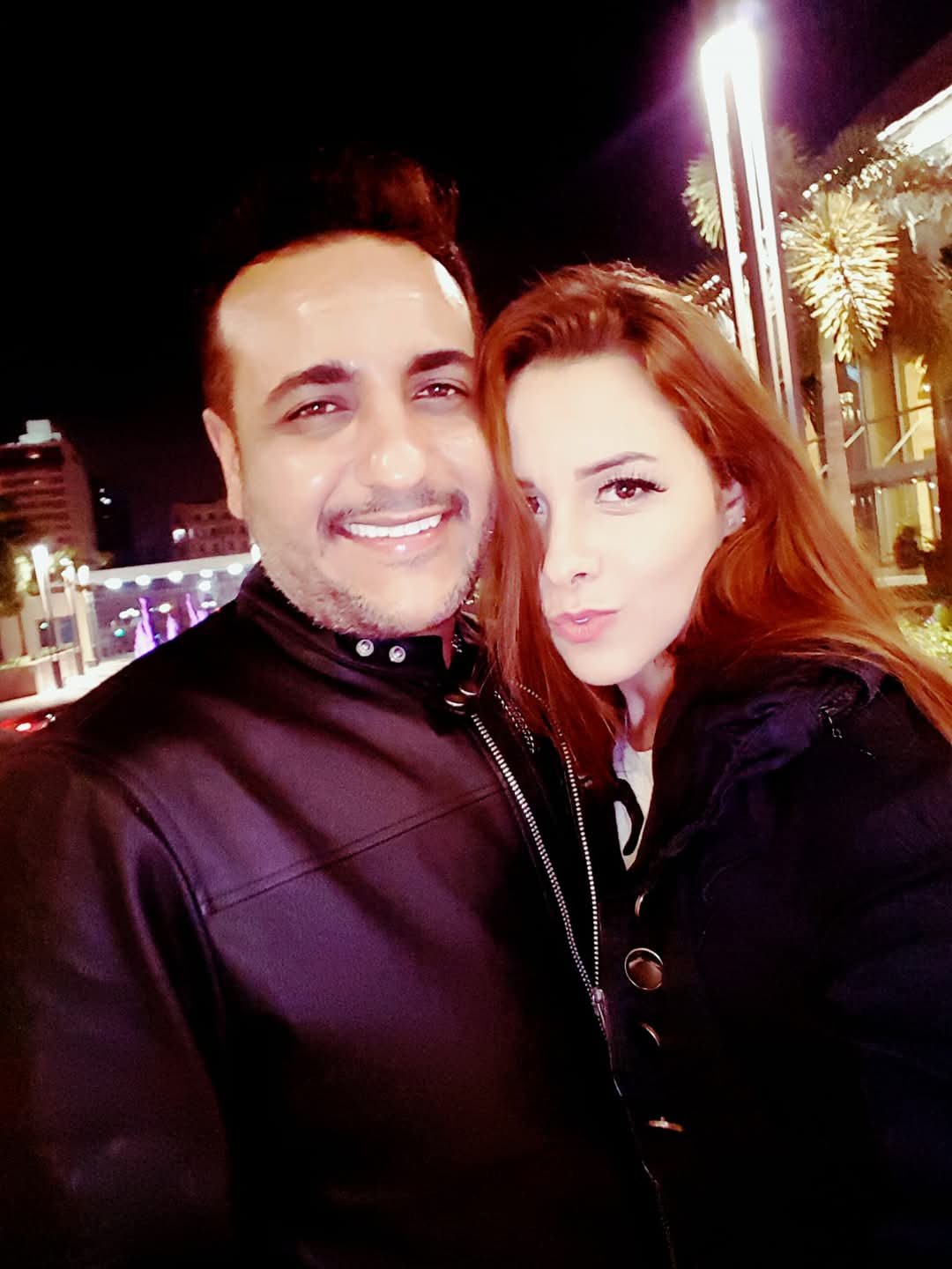 رحيم مع زوجته مدربه الأسود أنوسا كوتا